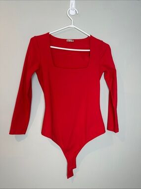 23. Free people body suit